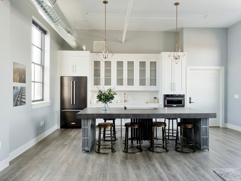 Open kitchen with exposed mechanicals — Hintonburg loft.