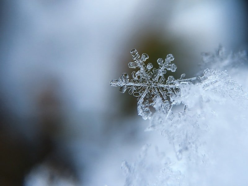 A snowflake on packed snow — Ottawa winter cold-snap pipe thawing and prevention.